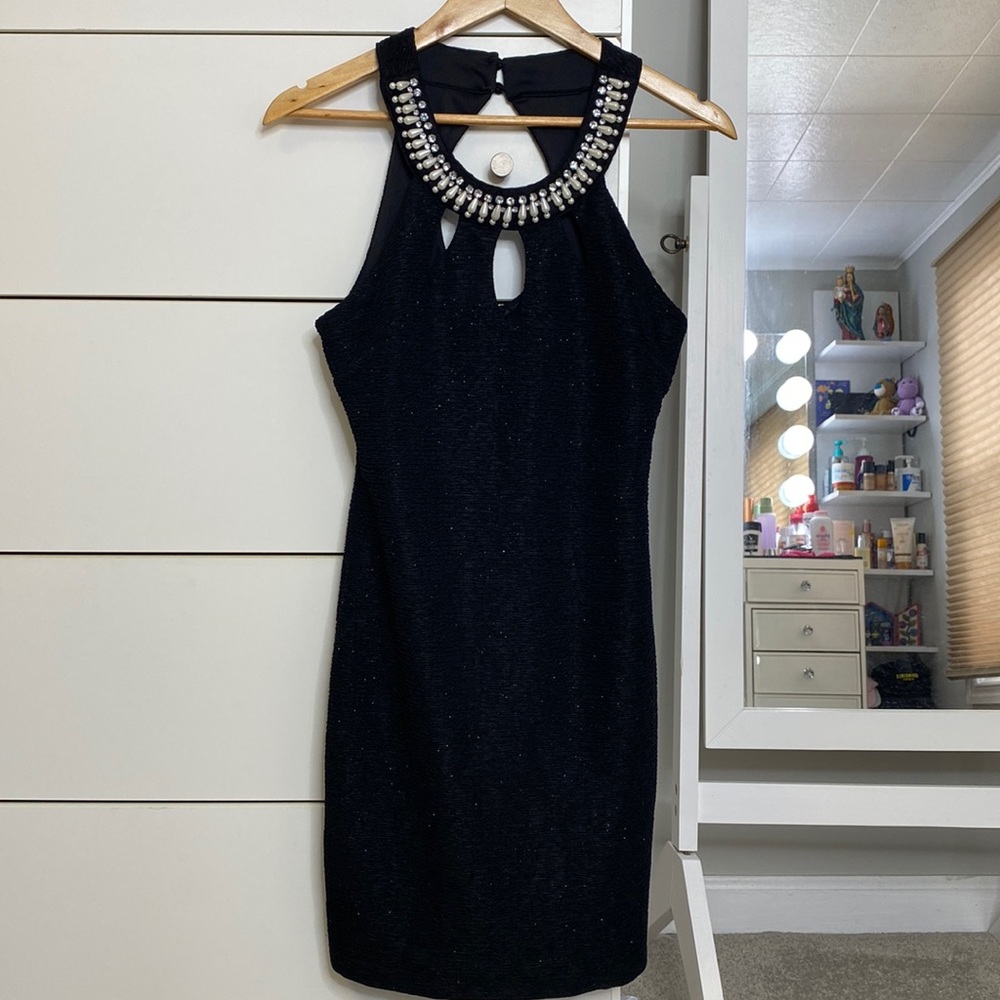 Black dress with some dots of shimmers